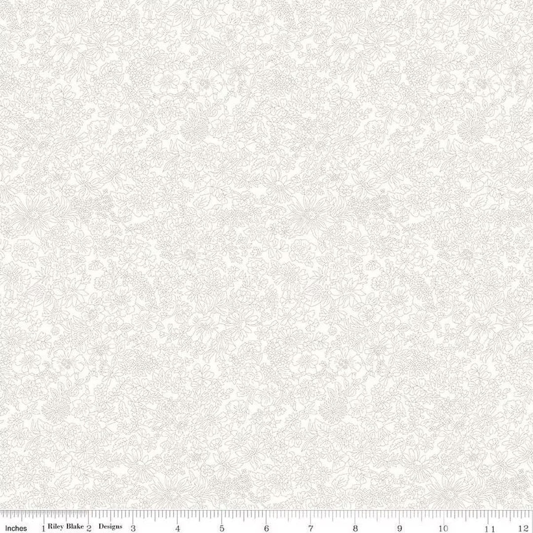 A closeup shot of the quilting fabric pattern called Ivory, part of Liberty Fabric's Emily Belle fabric collection by Riley Blake. SKU is 01666416A.