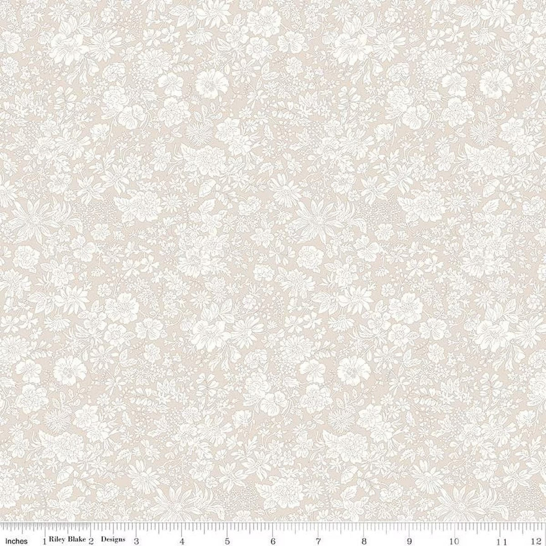 A closeup shot of the quilting fabric pattern called Parchment, part of Liberty Fabric's Emily Belle fabric collection by Riley Blake. SKU is 01666418A.