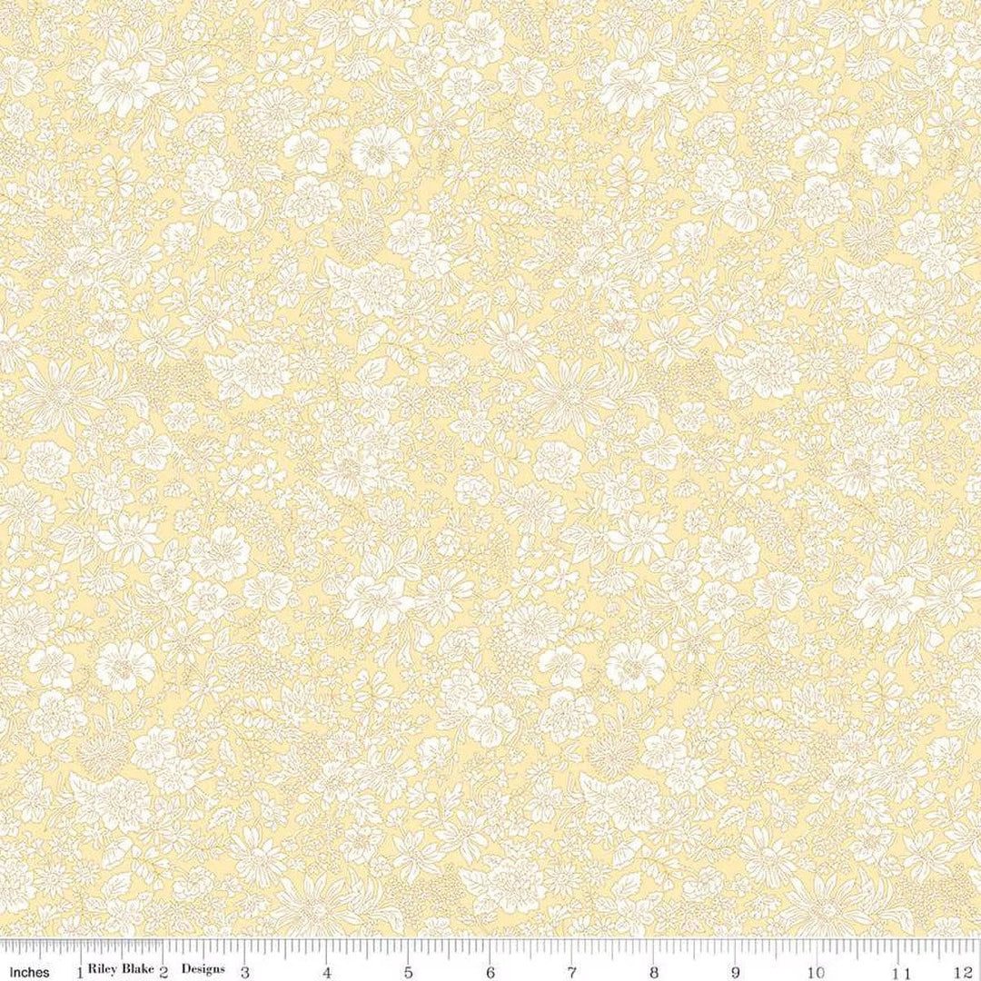 A closeup shot of the quilting fabric pattern called Magnolia, part of Liberty Fabric's Emily Belle fabric collection by Riley Blake. SKU is 01666421A.