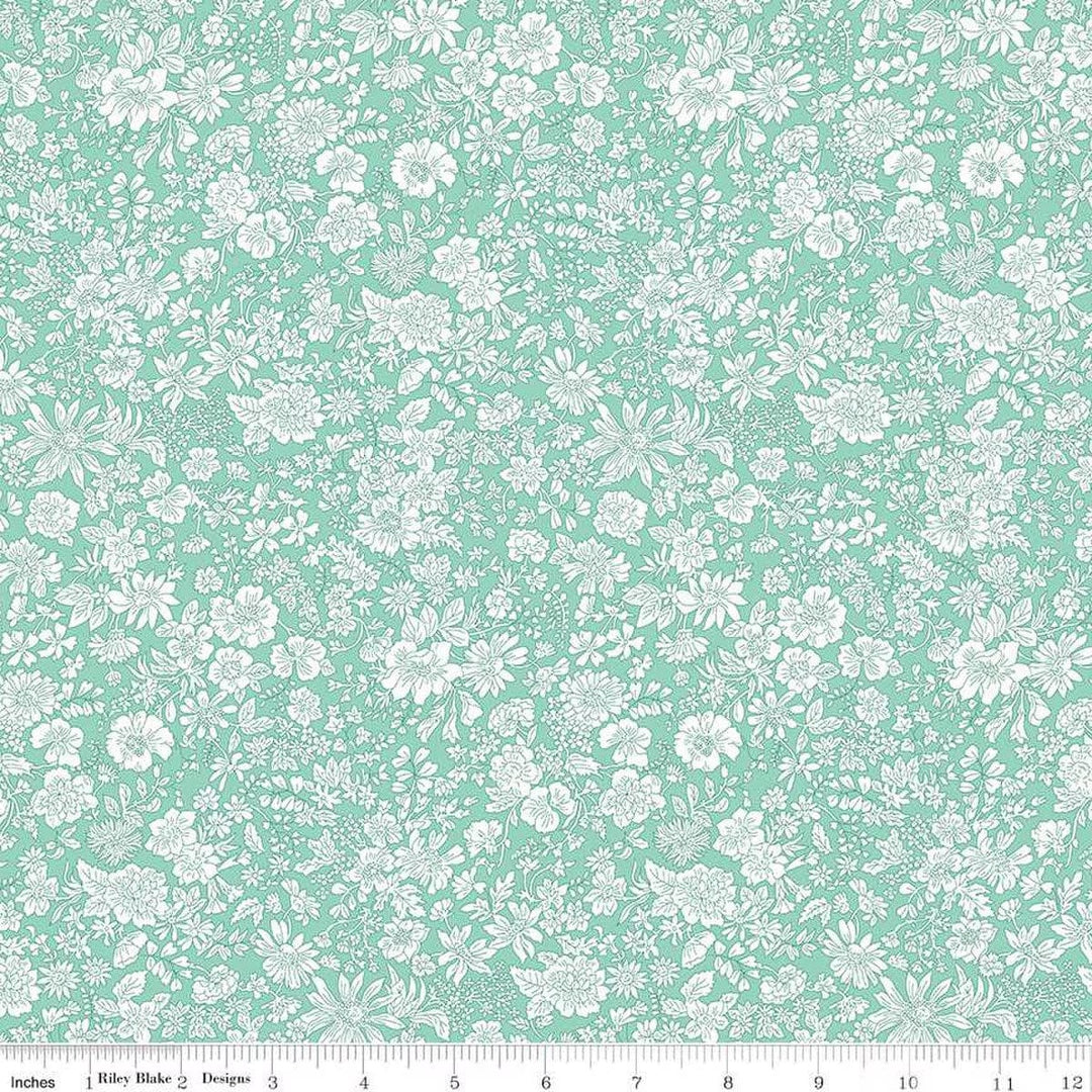 A closeup shot of the quilting fabric pattern called Soft Mint, part of Liberty Fabric's Emily Belle fabric collection by Riley Blake. SKU is 01666423A.
