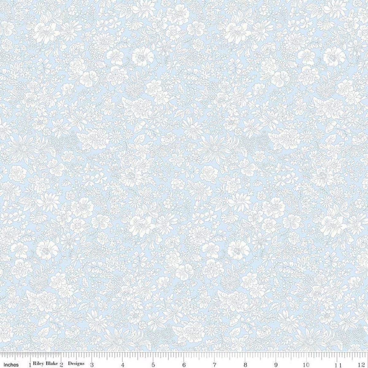 A closeup shot of the quilting fabric pattern called Pale Sky, part of Liberty Fabric's Emily Belle fabric collection by Riley Blake. SKU is 01666424A.