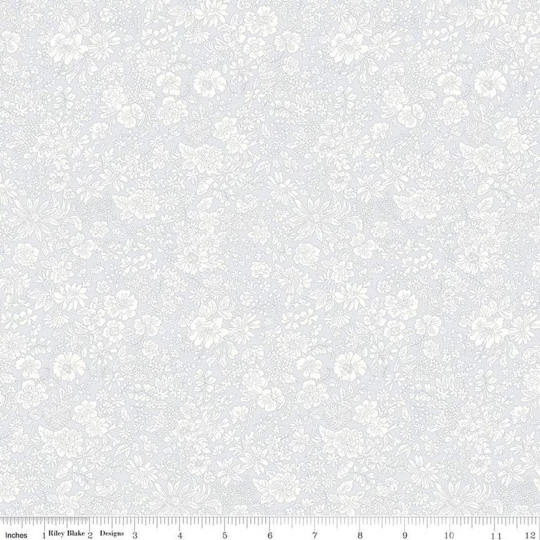 A closeup shot of the quilting fabric pattern called Silver Birch, part of Liberty Fabric's Emily Belle fabric collection by Riley Blake. SKU is 01666426A.