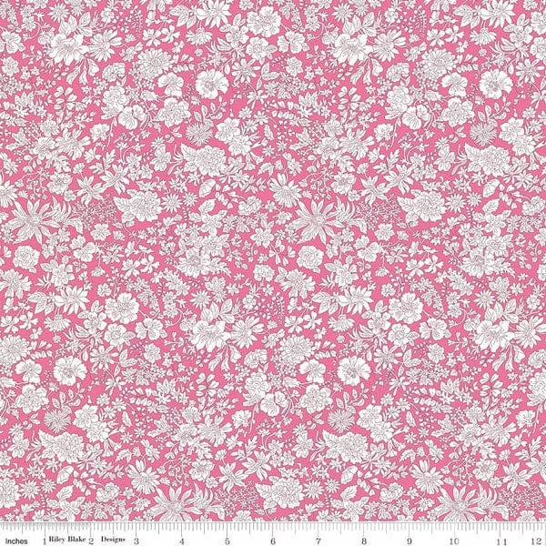 A closeup shot of the quilting fabric pattern called Bright Pink, part of Liberty Fabric's Emily Belle fabric collection by Riley Blake. SKU is 01666439A.