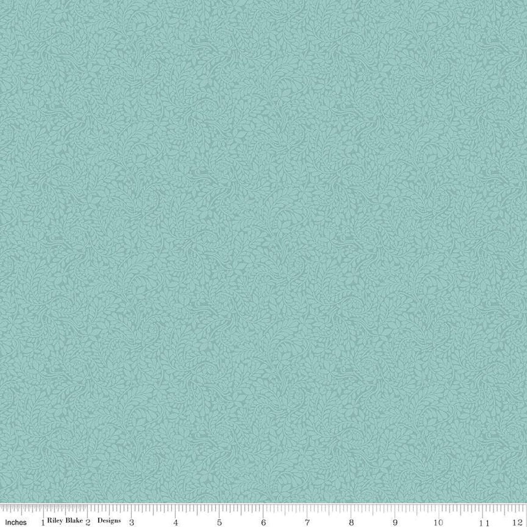 Cotton quilting fabric pattern called 'Duck Egg Blue'. Part of the 'The Wiltshire Shadow Collection' fabric collection. Designed by Liberty Fabrics for fabric company Riley Blake. SKU: 016668104A. 44-45 inch width.