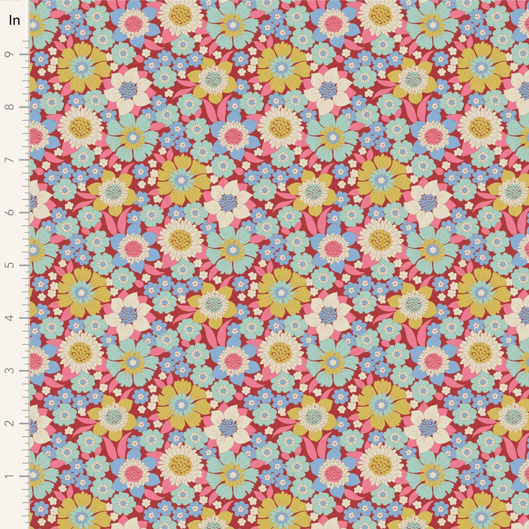 A closeup shot of the quilting fabric pattern called Lauren, designed by Tone Finnanger, in the burgundy colorway. The SKU is TIL100602.