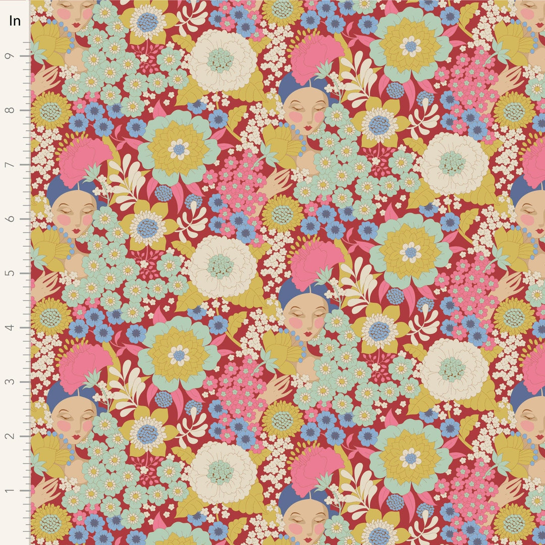 A closeup shot of the quilting fabric pattern called Wallflower, designed by Tone Finnanger, in the burgundy colorway. The SKU is TIL100606.