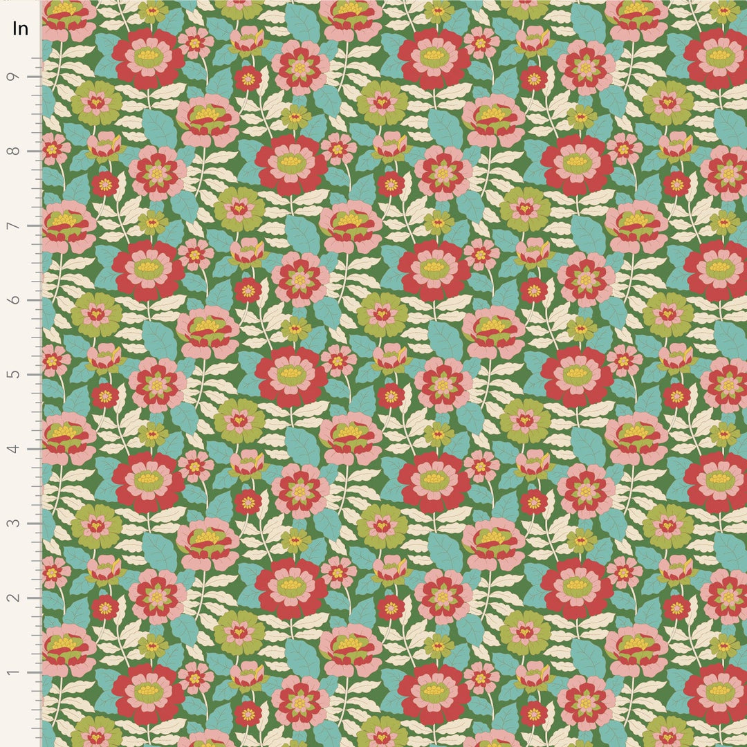 A closeup shot of the quilting fabric pattern called Beverly, designed by Tone Finnanger, in the green colorway. The SKU is TIL100609.