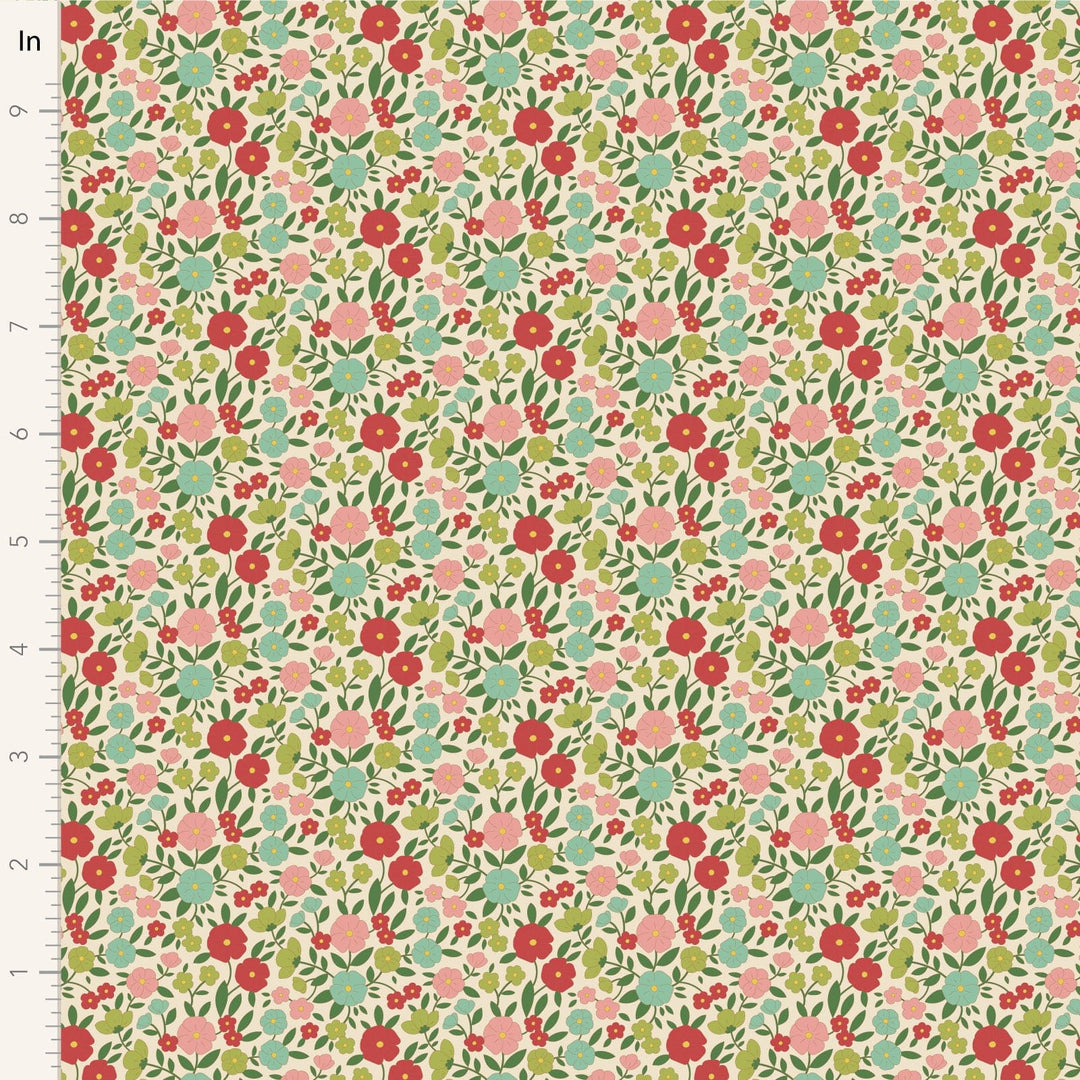 A closeup shot of the quilting fabric pattern called Janice, designed by Tone Finnanger, in the green colorway. The SKU is TIL100613.
