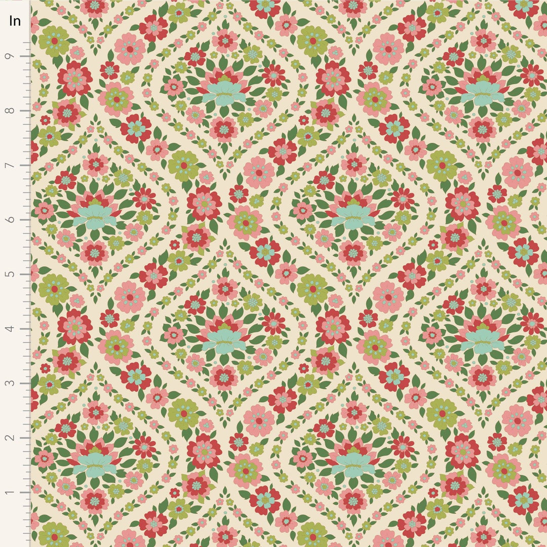 A closeup shot of the quilting fabric pattern called Bianca, designed by Tone Finnanger, in the green colorway. The SKU is TIL100617.