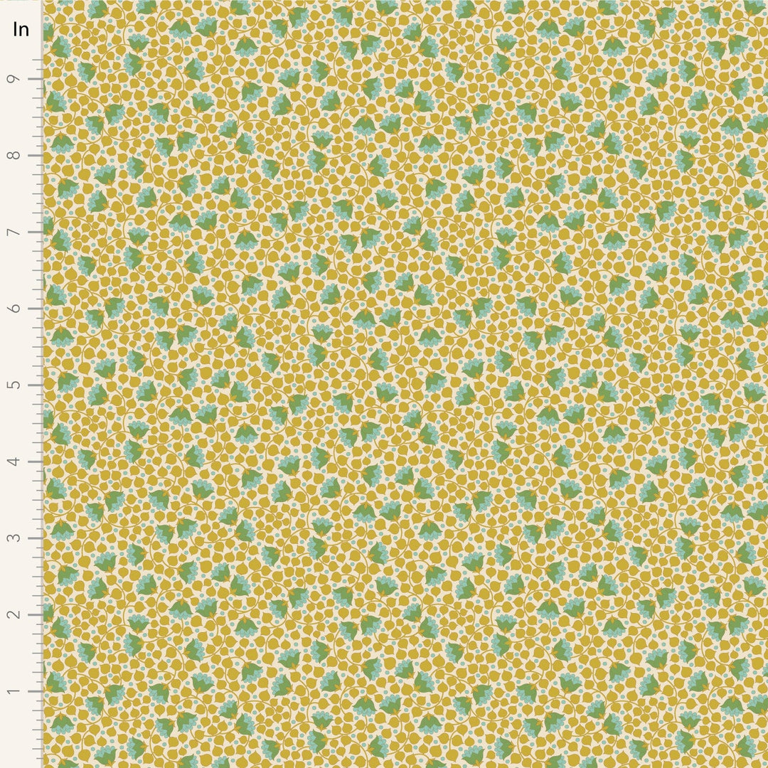 A closeup shot of the quilting fabric pattern called Bellflower, designed by Tone Finnanger, in the flaxen colorway. The SKU is TIL110130.
