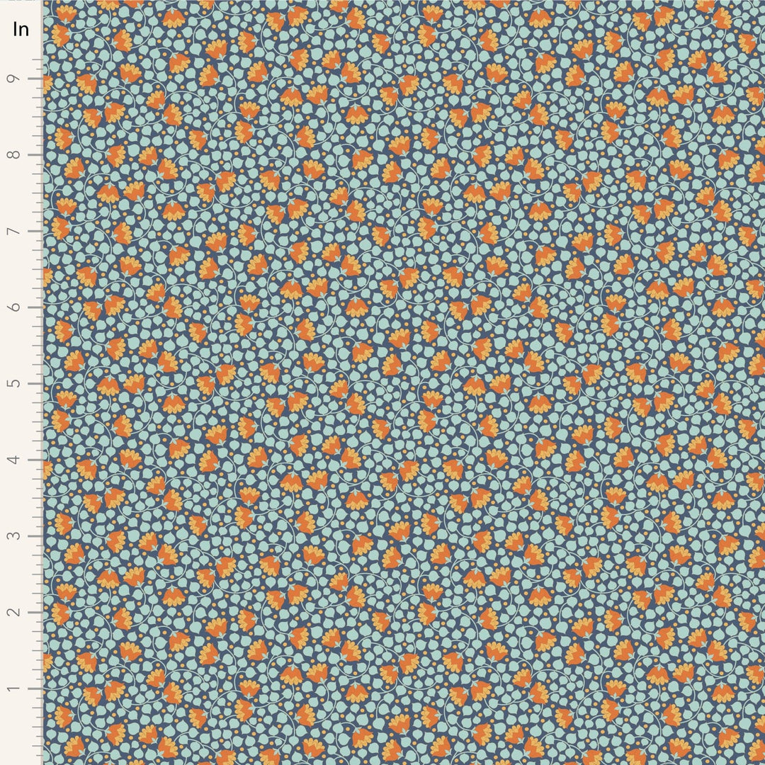 A closeup shot of the quilting fabric pattern called Bellflower, designed by Tone Finnanger, in the prussian colorway. The SKU is TIL110133.