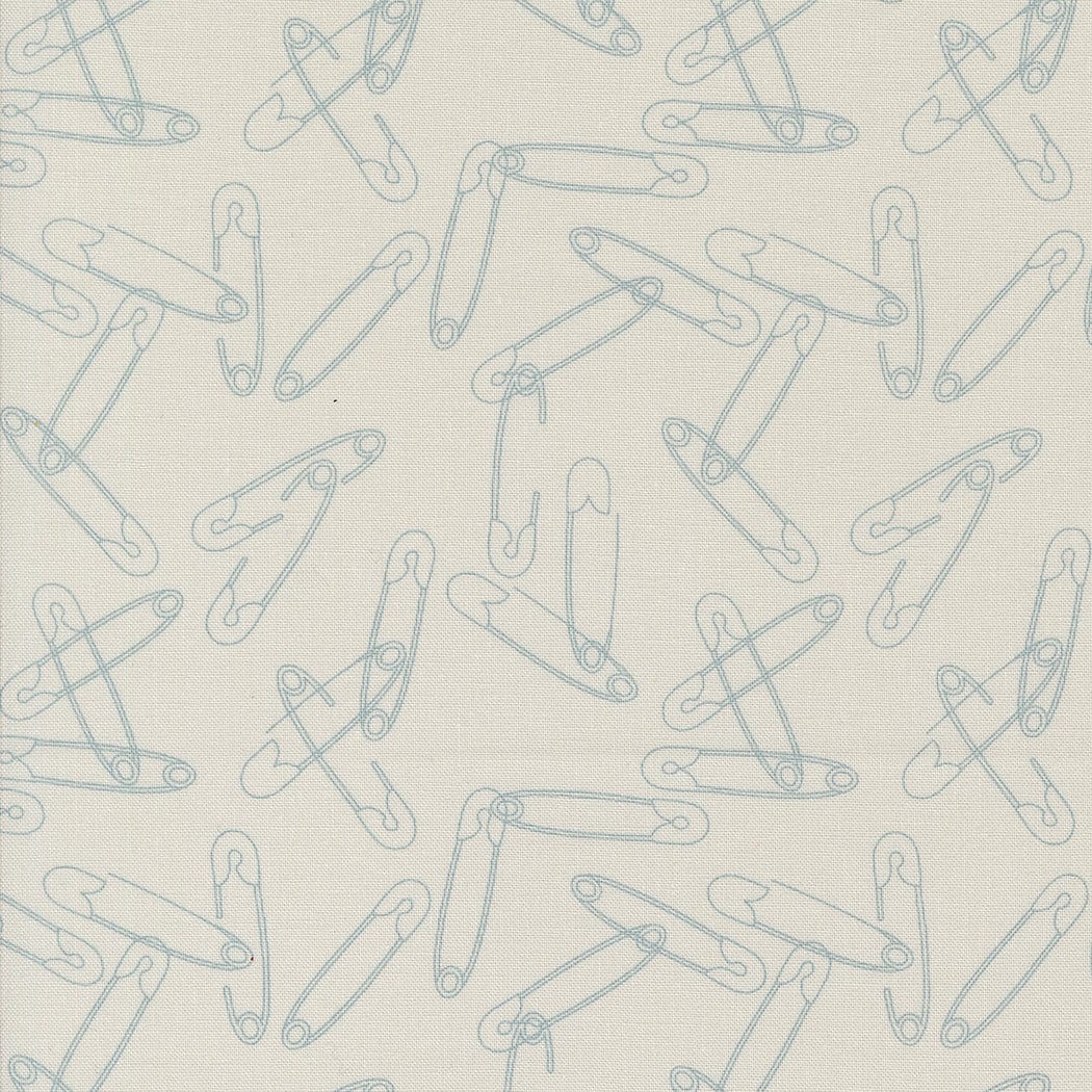 Cotton quilting fabric pattern called 'Safety Pins in Fog'. Part of the 'Still More Paper' fabric collection. Designed by Zen Chic for fabric company MODA. SKU: 1873 14. 44-45 inch width.