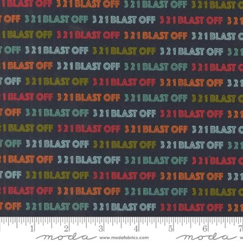 A closeup shot of the quilting fabric pattern called Countdown, designed by Stacy Iest Hsu, in the night sky colorway. The SKU is 20952 15.