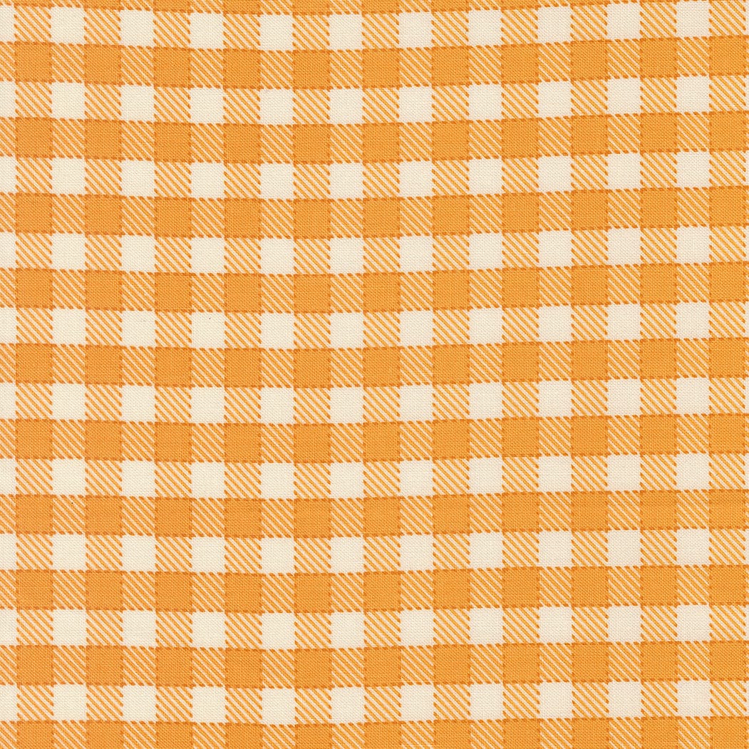 A closeup shot of the quilting fabric pattern called Baby Check, designed by Stacy Iest Hsu, in the canary colorway. The SKU is 20966 18.