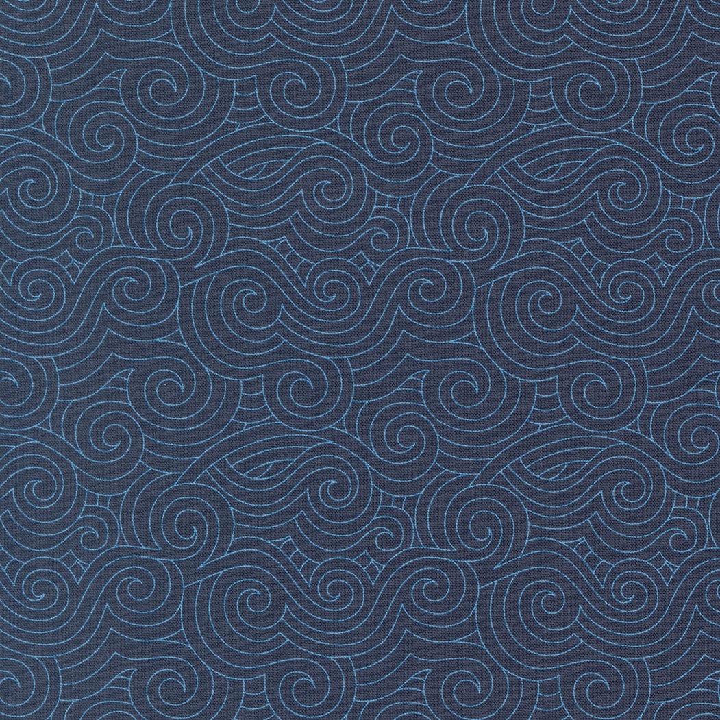 A closeup shot of the quilting fabric pattern called Turbulence, designed by Sariditty, in the navy colorway. The SKU is 45065 18.