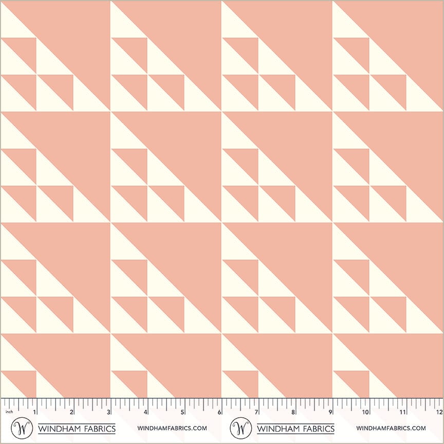 A closeup shot of the quilting fabric pattern called Birds in the Air, designed by Whistler Studios, in the pink colorway. The SKU is 54880-4.