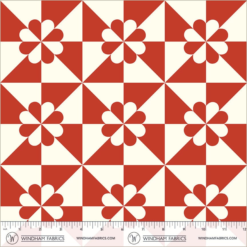A closeup shot of the quilting fabric pattern called Hearts and Gizzards, designed by Whistler Studios, in the red colorway. The SKU is 54881-1.