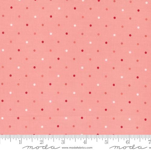 A closeup shot of the quilting fabric called Magic Dot, designed by Lella Boutique, in the pink lemonade colorway. The SKU is 5230 34.