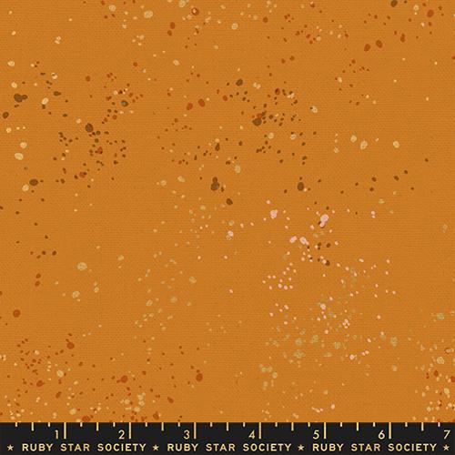 A closeup shot of the canvas fabric pattern called Speckled, designed by Rashida Coleman Hale, in the Earth colorway. The SKU is RS11177 26LM