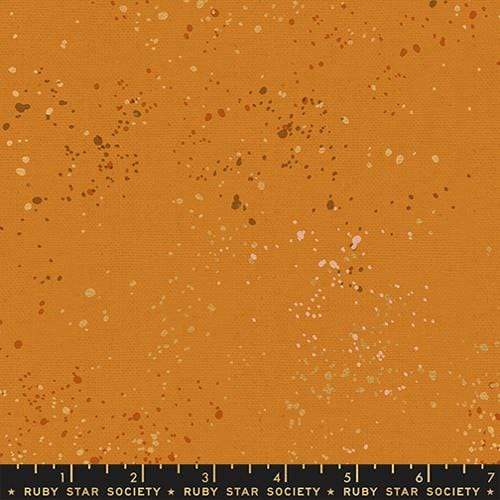 A closeup shot of the canvas fabric pattern called Speckled, designed by Rashida Coleman Hale, in the Earth colorway. The SKU is RS11177 26LM