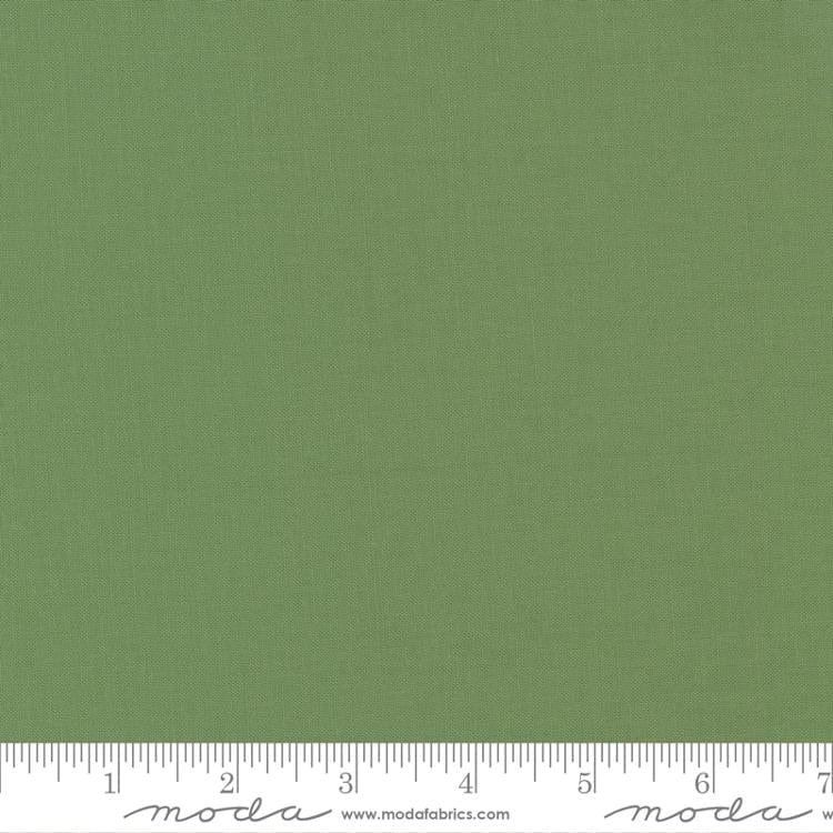 Cotton quilting fabric pattern called 'Prairie Green'. Part of the 'Bella Solids' fabric collection. Designed by Moda Fabrics for fabric company Moda Fabrics. SKU: 9900 102. 44-45 inch width.