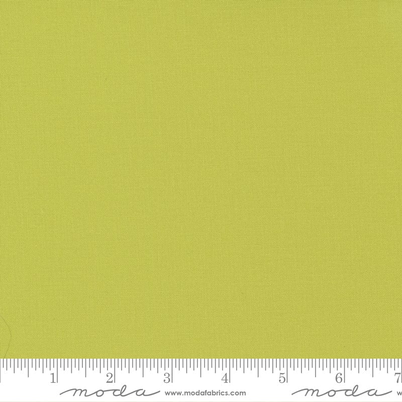 Cotton quilting fabric pattern called 'Chartreuse'. Part of the 'Bella Solids' fabric collection. Designed by Moda Fabrics for fabric company Moda Fabrics. SKU: 9900 188. 44-45 inch width.
