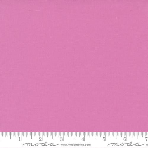 Cotton quilting fabric pattern called 'Sweet Pea- 9900 387'. Part of the 'Bella Solids' fabric collection. Designed by Moda for fabric company Moda. SKU: 9900 387. 44-45 inch width.