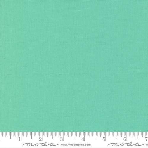 Cotton quilting fabric pattern called 'Green'. Part of the 'Bella Solids' fabric collection. Designed by Moda Fabrics for fabric company Moda Fabrics. SKU: 9900 65. 44-45 inch width.