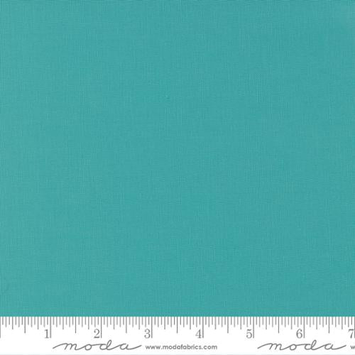 Cotton quilting fabric pattern called 'Caribbean'. Part of the 'Bella Solids' fabric collection. Designed by Moda Fabrics for fabric company Moda Fabrics. SKU: 9900 211. 44-45 inch width.