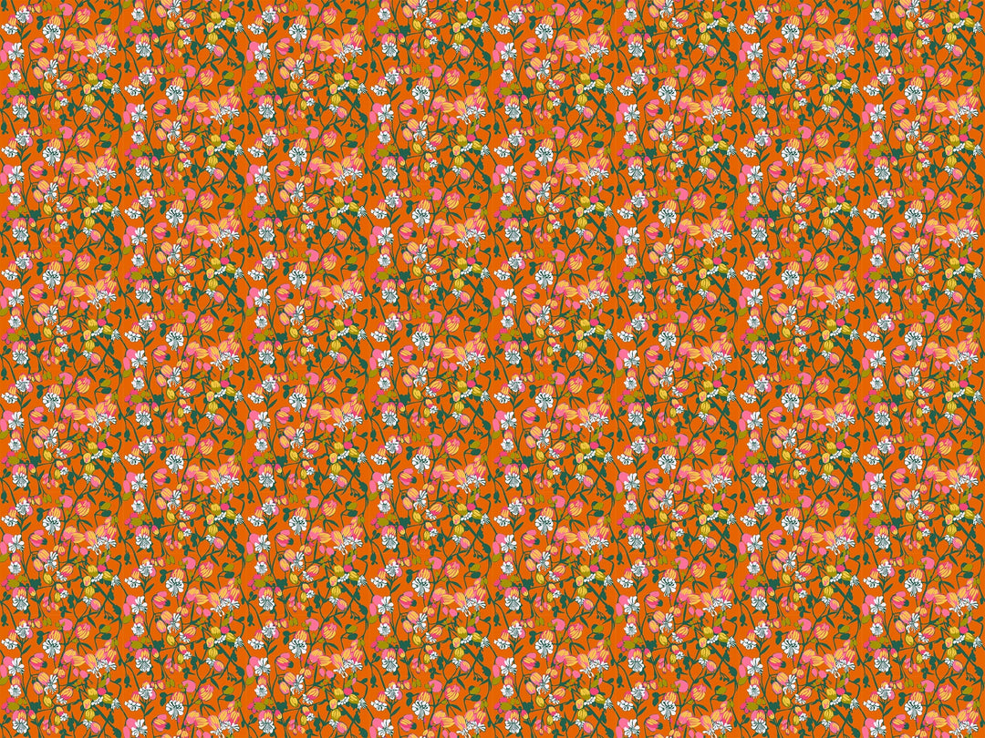 A closeup shot of the quilting fabric called Silene, designed by Anna Maria Horner, in the tangerine colorway. The SKU is AMT127-59L.