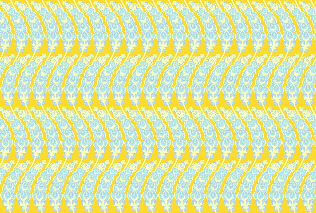 A closeup shot of the quilting fabric pattern called Bells of Ireland, designed by Anna Maria Horner, in the sunny colorway. The SKU is AMT133-52C.