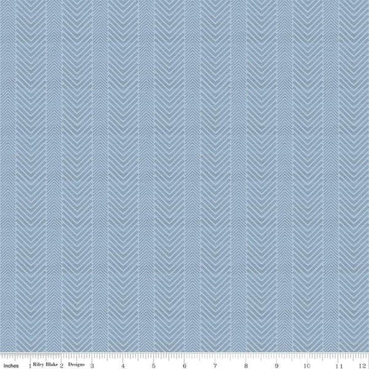 Cotton quilting fabric pattern called 'Herringbone in Sky'. Part of the 'Wake at the Lake' fabric collection. Designed by Tara Reed for fabric company Riley Blake. SKU: C14893-SKY. 44-45 inch width.
