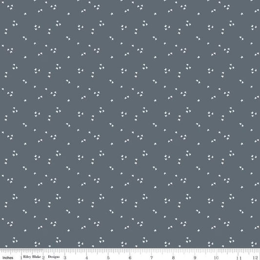 A closeup shot of the quilting fabric pattern called Shining Star, designed by Jennifer Long for Riley Blake, in the smoke colorway. The SKU is C15466-SMOKE.