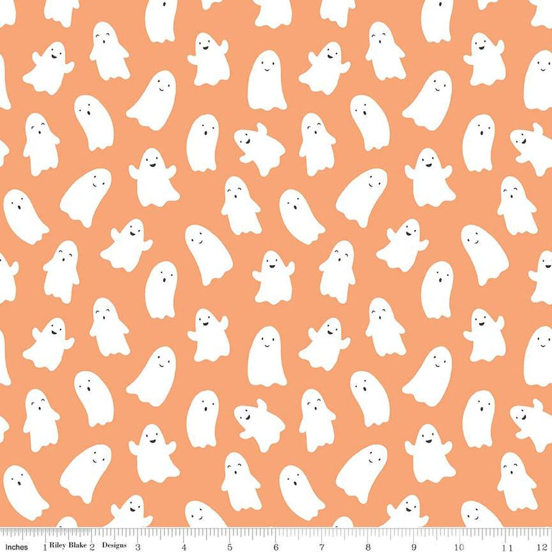 A closeup shot of the quilting fabric pattern called Ghosts, designed by My Mind's Eye for Riley Blake, in the pumpkin colorway. The SKU is C16032-PUMPKIN.