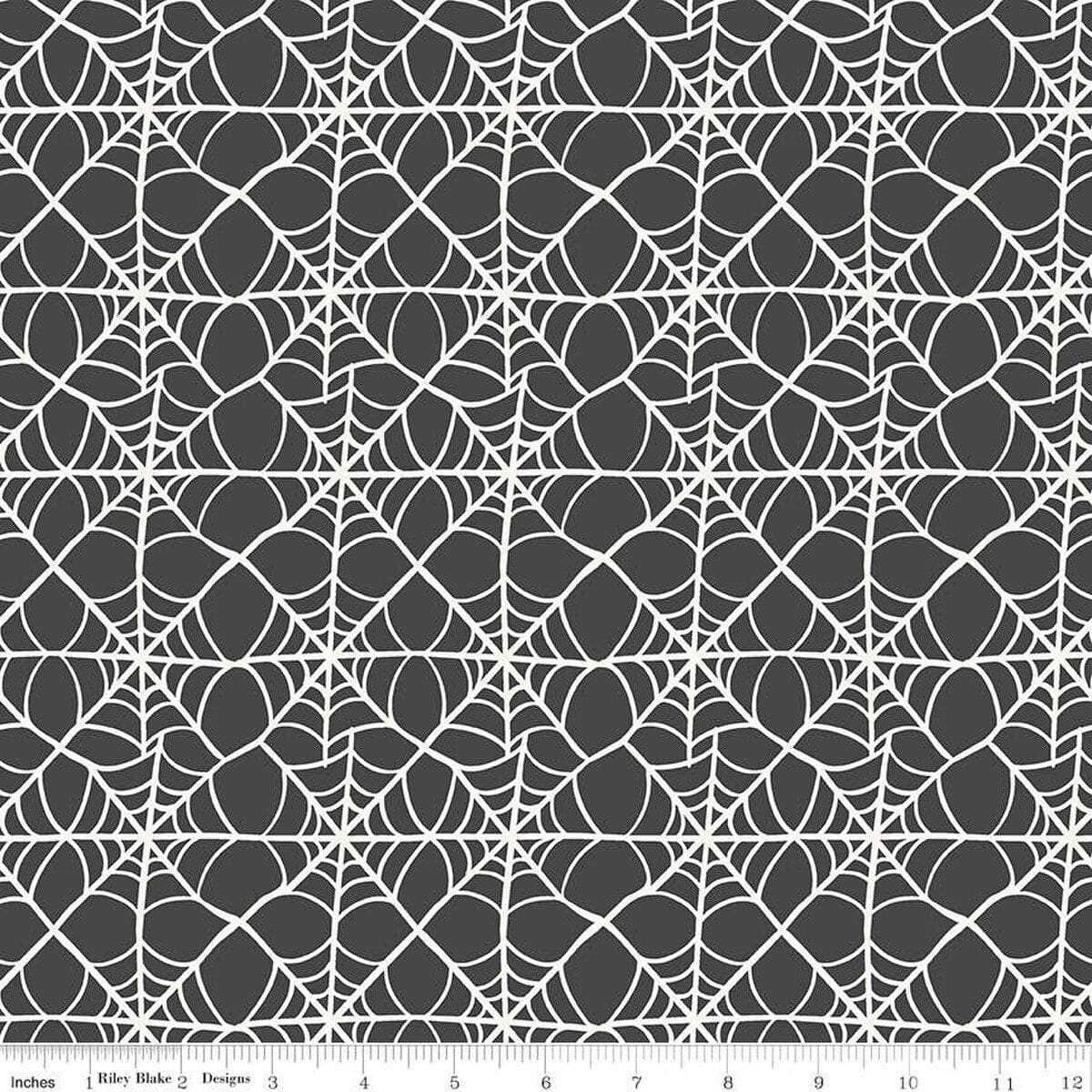 A closeup shot of the quilting fabric pattern called Webs, designed by My Mind's Eye for Riley Blake, in the charcoal colorway. The SKU is C16033-CHARCOAL.
