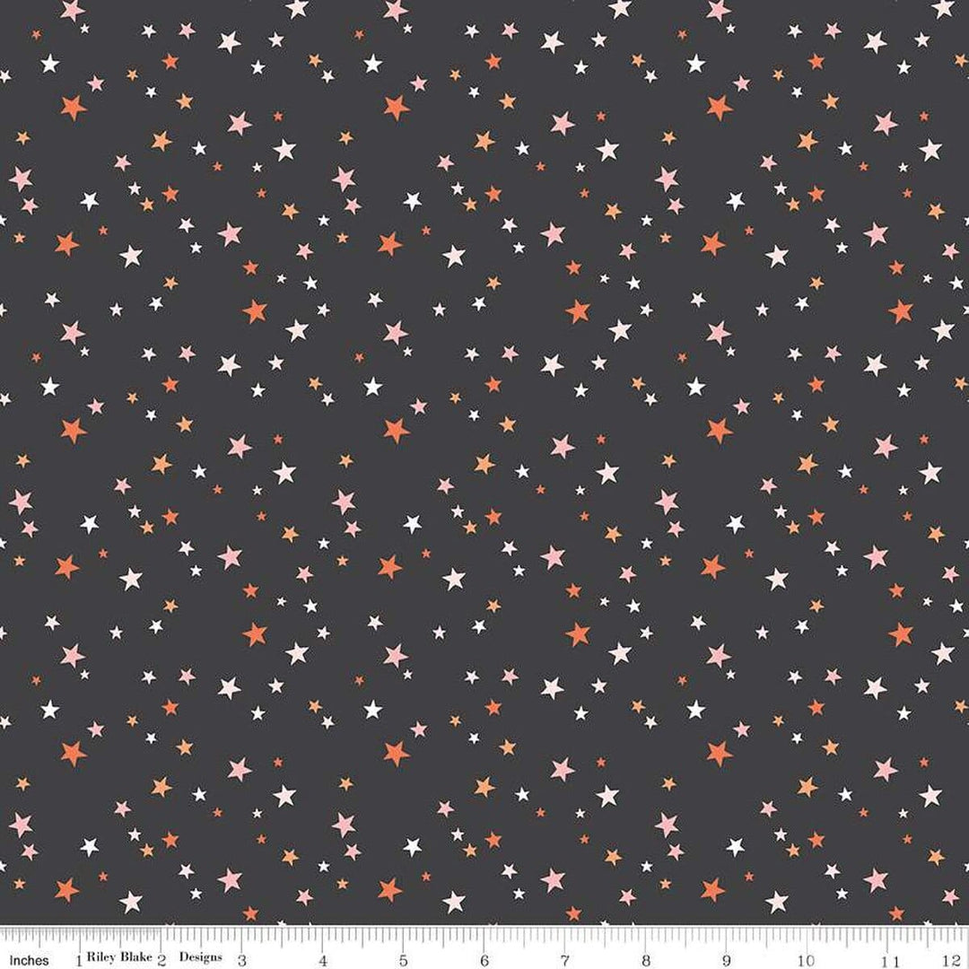 A closeup shot of the quilting fabric pattern called Stars, designed by My Mind's Eye for Riley Blake, in the charcoal colorway. The SKU is C16037-CHARCOAL.