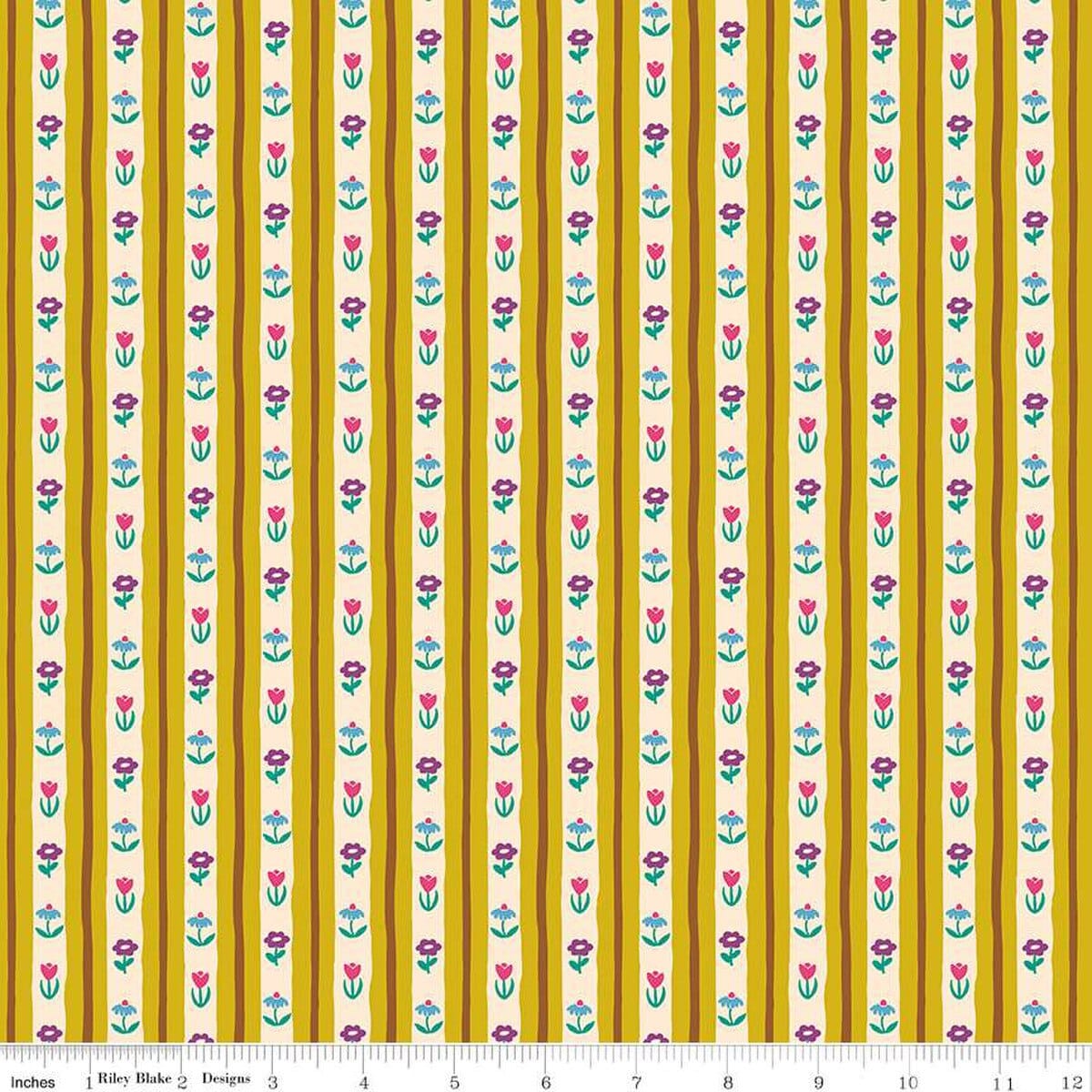 A closeup shot of the quilting fabric pattern called Bavarian Blooms, designed by Genesis Hall, in the curry colorway. The SKU is C16934-CURRY.