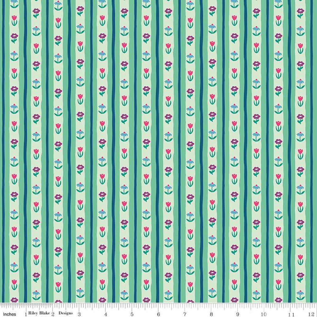 A closeup shot of the quilting fabric pattern called Bavarian Blooms, designed by Genesis Hall, in the mint colorway. The SKU is C16934-MINT.
