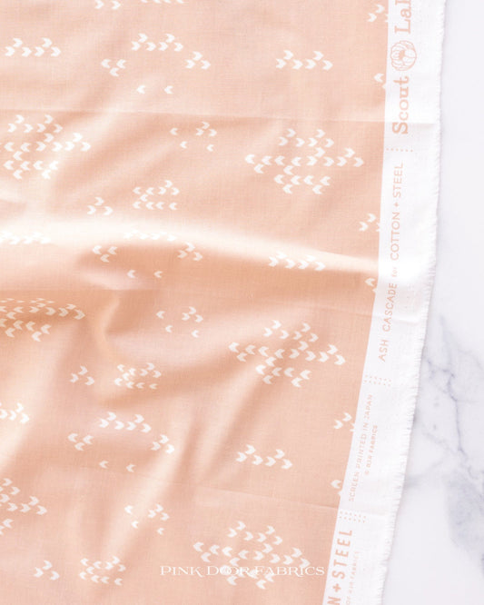 Cotton quilting fabric pattern called 'Reflection in Wild Rose'. Part of the 'Scout Lake' fabric collection. Designed by Ash Cascade for fabric company RJR Fabrics. SKU: AC404-WR4. 44-45 inch width.