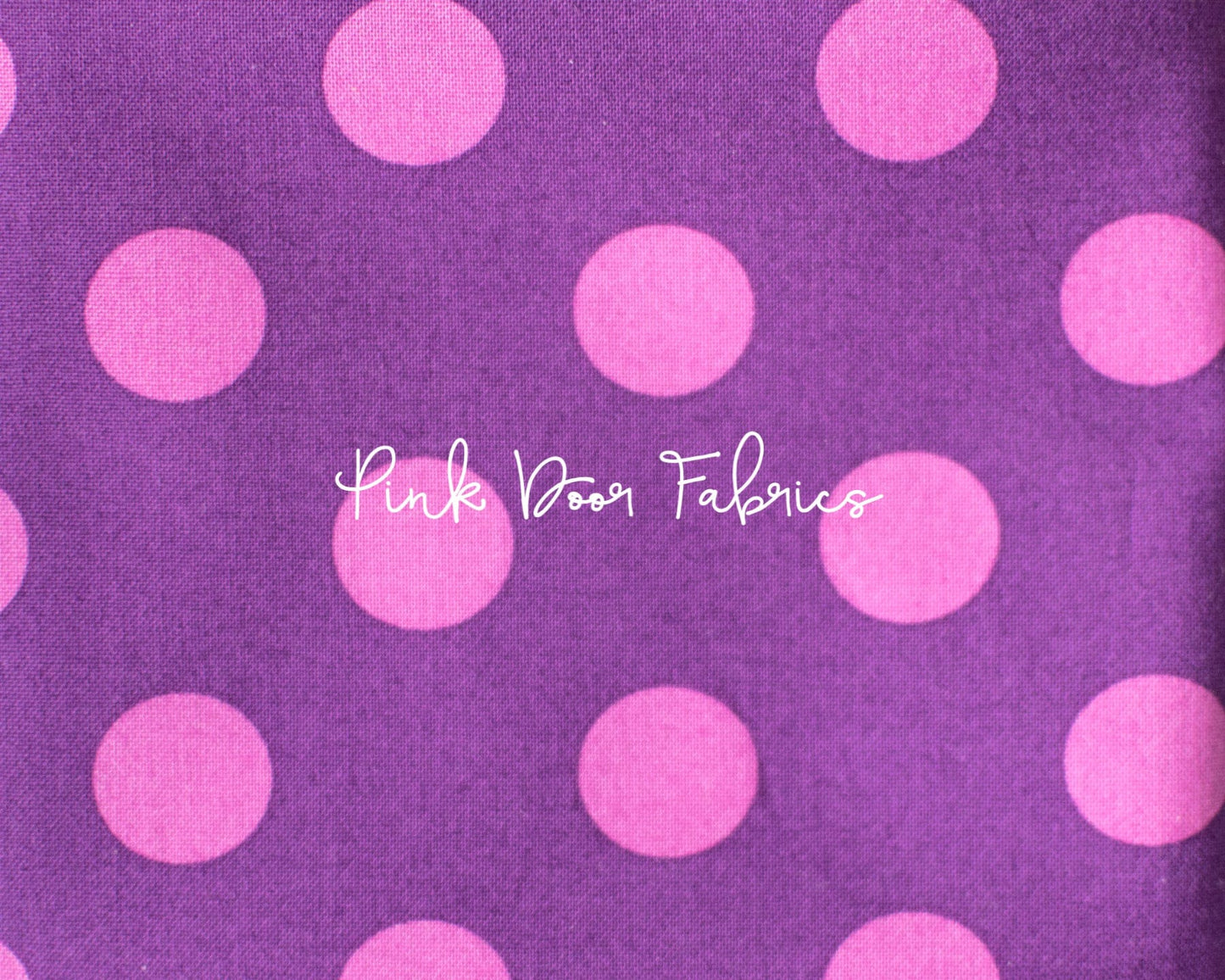 Cotton quilting fabric pattern called 'Pom Poms in Foxglove'. Part of the 'True Colors' fabric collection. Designed by Tula Pink for fabric company Free Spirit Fabrics. SKU: PWTP118.FOXGLOVE. 44-45 inch width.