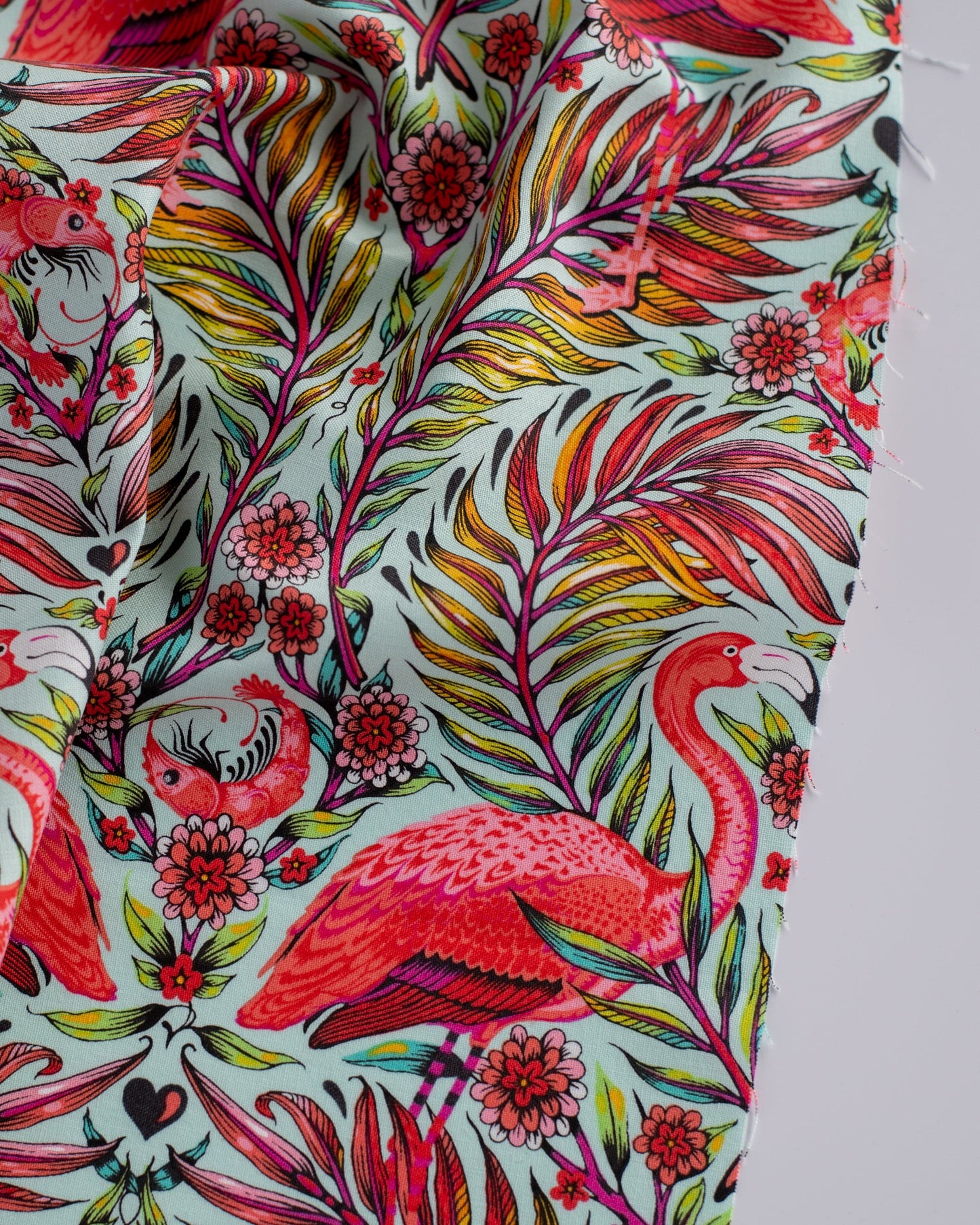 Cotton quilting fabric pattern called 'Pretty in Pink in Mango'. Part of the 'Daydreamer' fabric collection. Designed by Tula Pink for fabric company Free Spirit Fabrics. SKU: PWTP169.MANGO. 44-45 inch width.