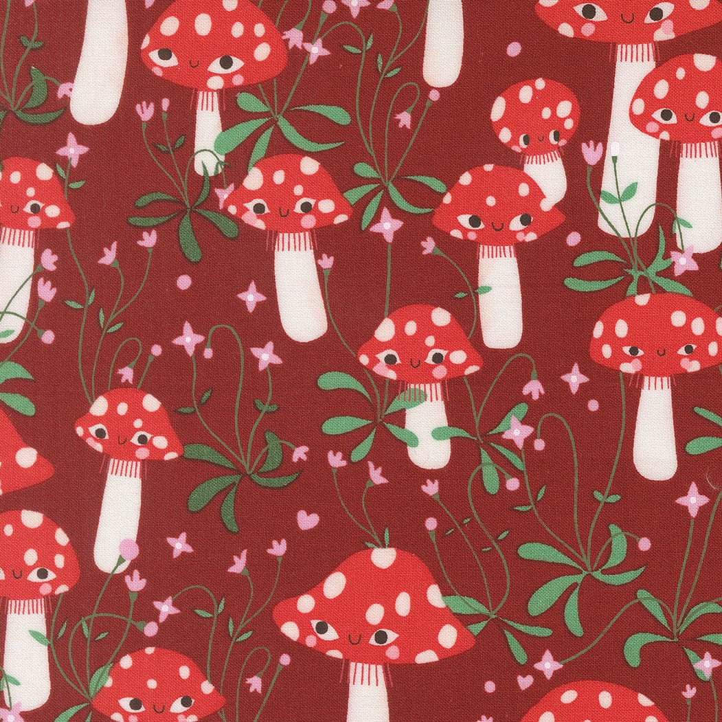 A closeup shot of the quilting fabric pattern called Mushrooms, designed by Lizzy House, in the rose colorway. The SKU is 37141 17.