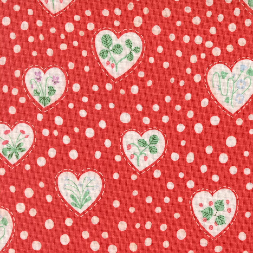 A closeup shot of the quilting fabric pattern called Flower Heart, designed by Lizzy House, in the love colorway. The SKU is 37144 16.