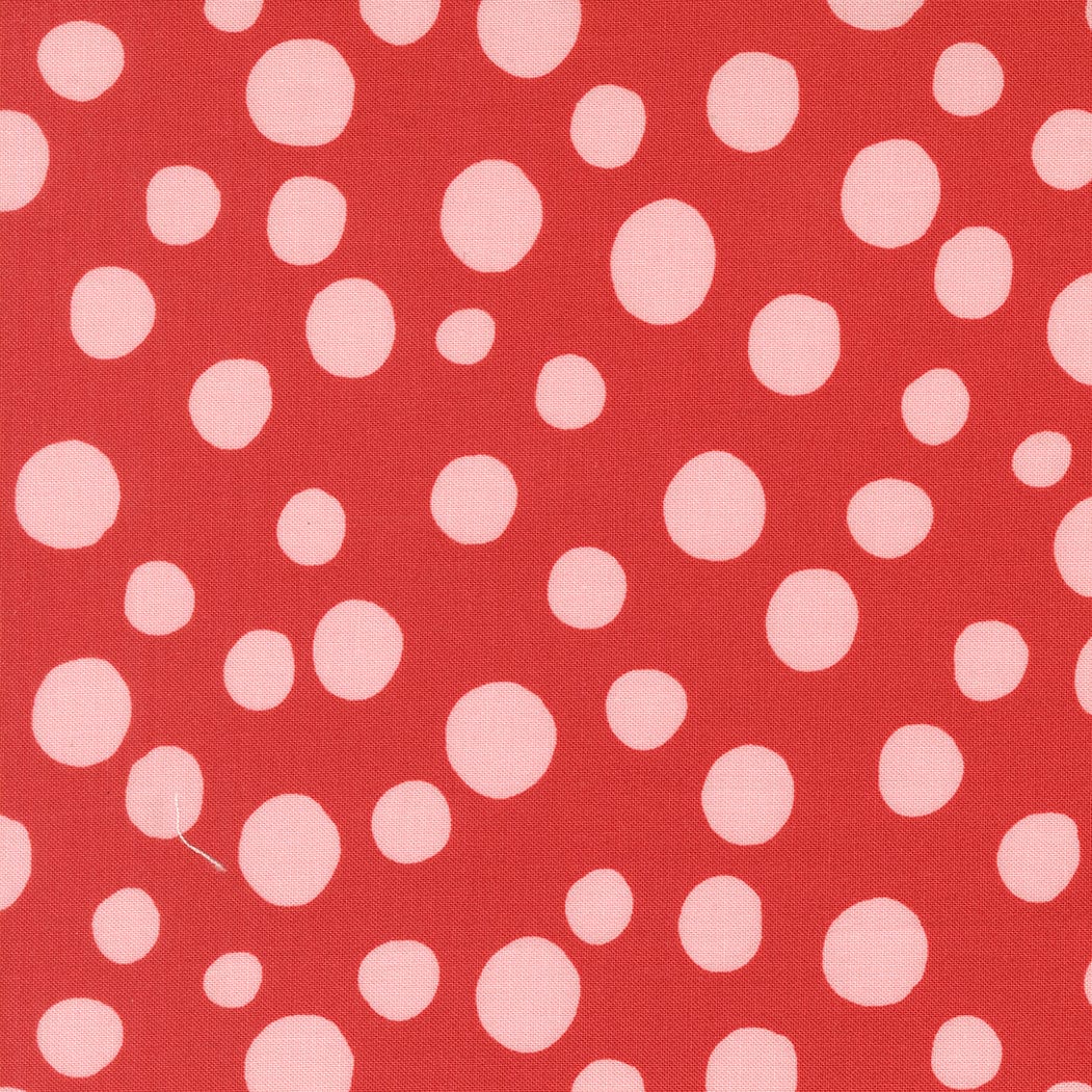 A closeup shot of the quilting fabric pattern called Big Dot, designed by Lizzy House, in the love colorway. The SKU is 37145 16.