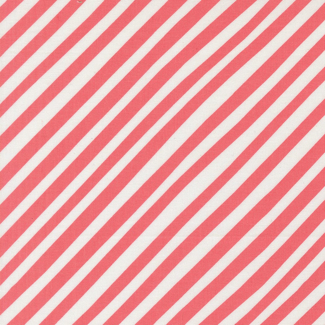 A closeup shot of the quilting fabric pattern called Stripes, designed by Lizzy House, in the coral colorway. The SKU is 37146 11.