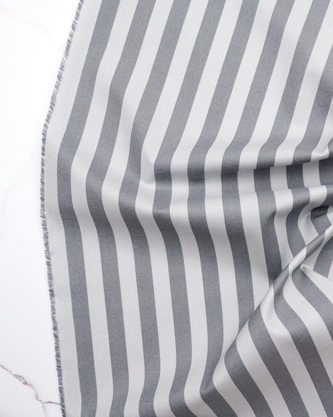 Tent Stripe in Fog quilting fabric, part of the Fall 2025 True Colors fabric collection by Tula Pink (SKU: PWTP069.FOG)