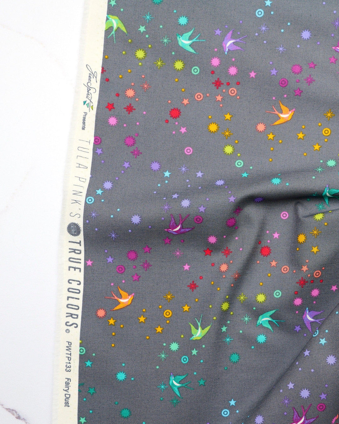 Fairy Dust in Shadow quilting fabric, part of the Fall 2025 True Colors fabric collection by Tula Pink (SKU: PWTP133.SHADOW)