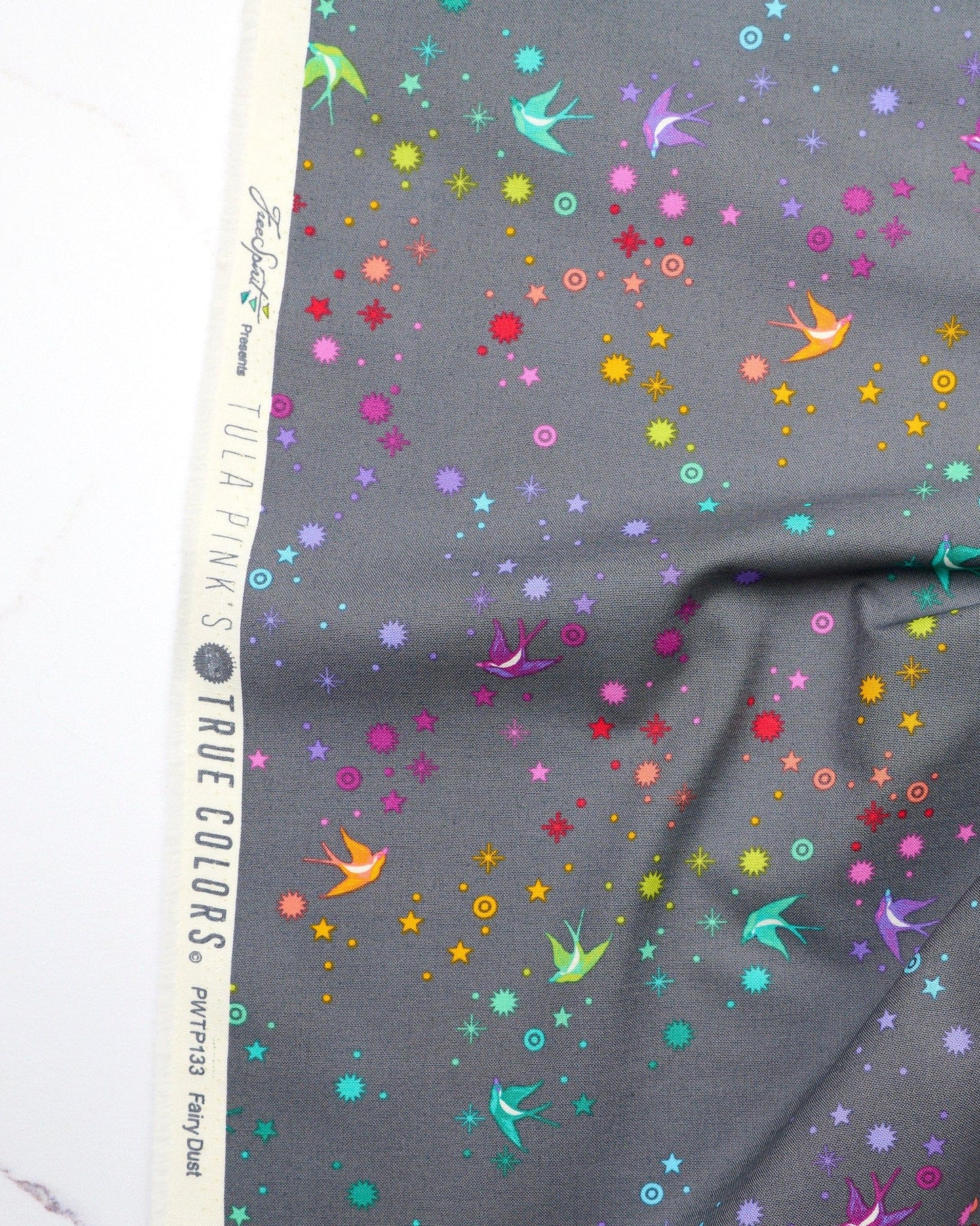 Fairy Dust in Shadow quilting fabric, part of the Fall 2025 True Colors fabric collection by Tula Pink (SKU: PWTP133.SHADOW)
