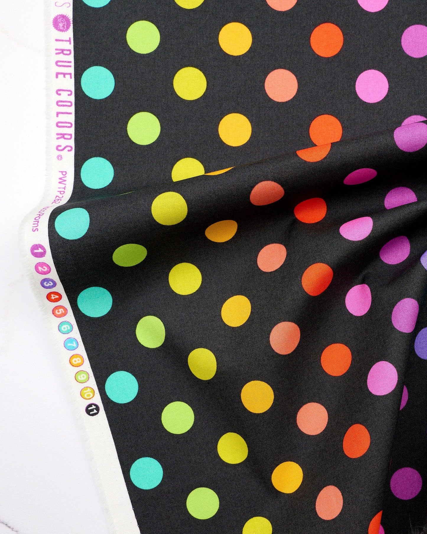 Disco Poms in Carbon quilting fabric, part of the Fall 2025 True Colors fabric collection by Tula Pink (SKU: PWTP262.CARBON)