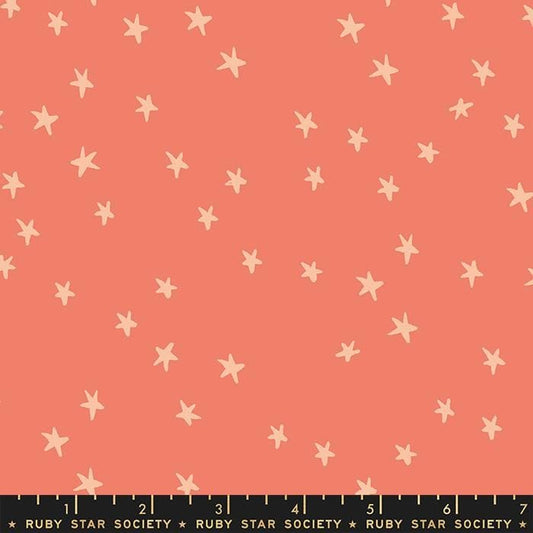 Cotton quilting fabric pattern called 'Starry in Papaya'. Part of the 'Starry' fabric collection. Designed by Ruby Star Society for fabric company Moda Fabrics. SKU: RS4109 54. 44-45 inch width.